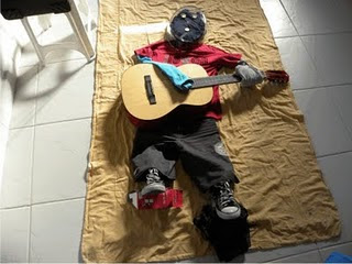 O Menino e o Violão. (Caio Roque)